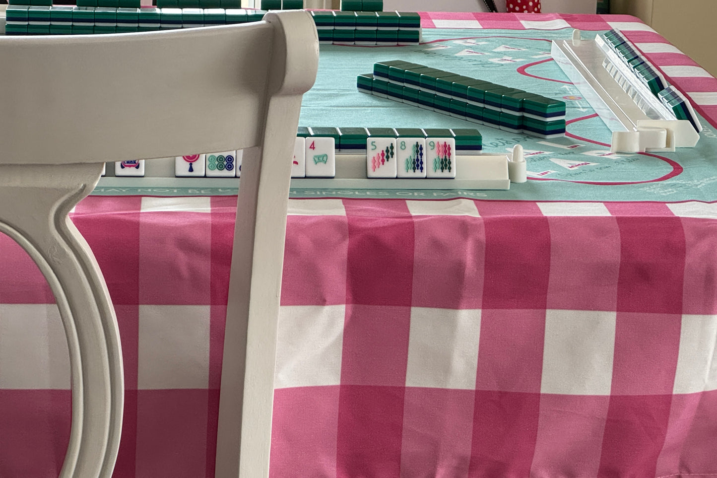 Side View - Pink Buffalo Check and Teal Mahjong tablecloth - Happy Yellow Paper