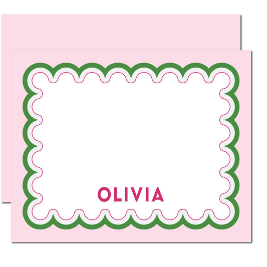 Pink personalized notecard with green scallop design, pink back, and matching envelopes