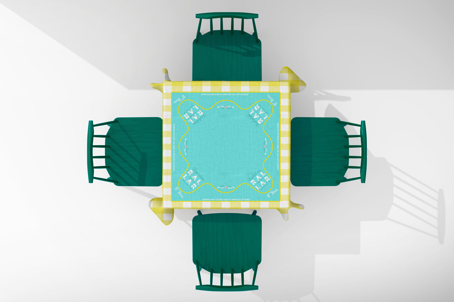 mahjong Tablecloth Top-down view of yellow gingham and teal Mahjong playing area