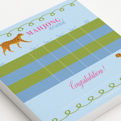 Mahjong scorecard with cheetah design on a blue and green striped background - Happy Yellow Paper
